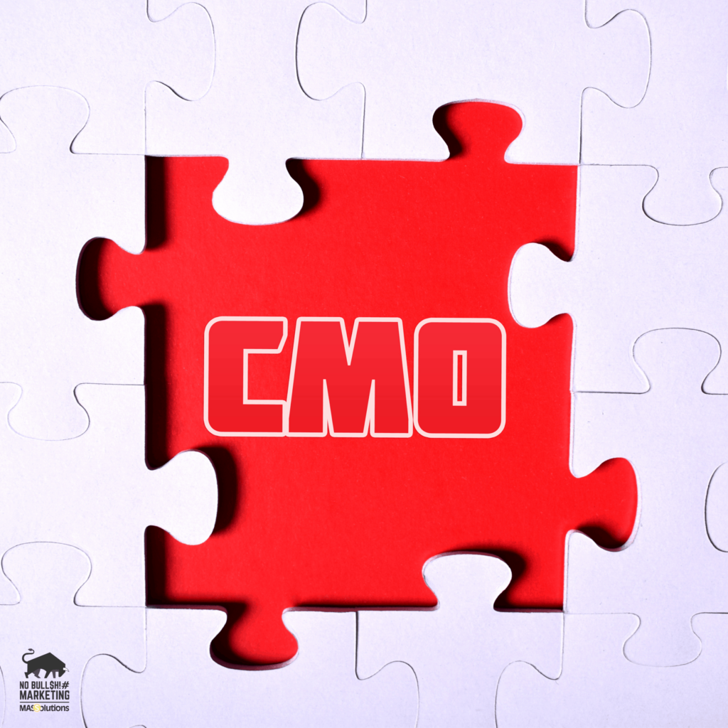 Red puzzle piece with "CMO" written on the image.